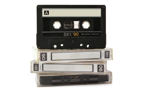 Audio cassette on three boxes isolated on white background — Stock Photo, Image