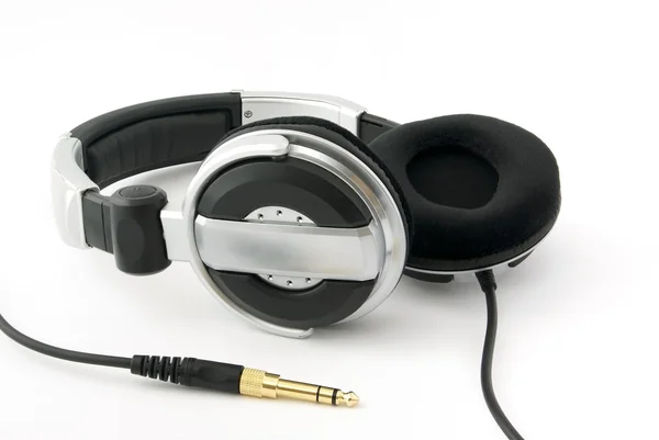 Ακουστικά με χρυσό βύσμα σε άσπρο φόντο — Φωτογραφία Αρχείου