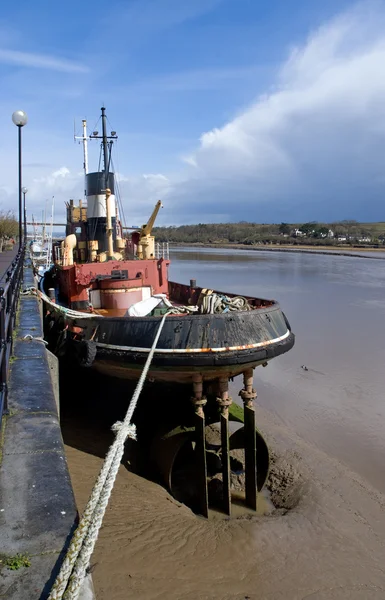 stock image Tug boat at low tide