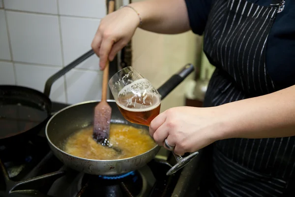 stock image Cooking beer risotto in restaurant kitch