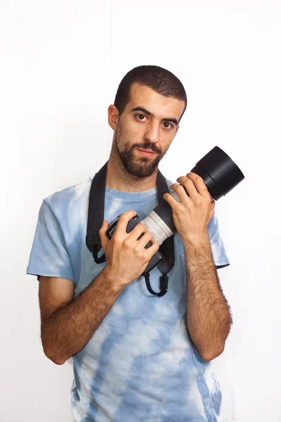 Az ember az ő reflex kamerával — Stock Fotó