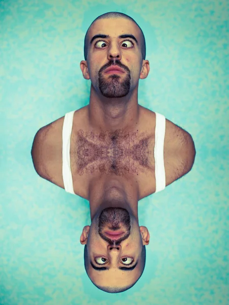 Doppelbild eines jungen Mannes mit lustigem Gesicht — Stockfoto