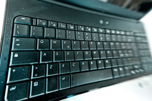 Warped view of a laptop keyboard — Stock Photo, Image