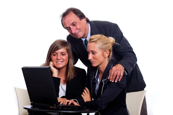 Senior Businessman with Young Businesswoman Look Computer Stock Photo