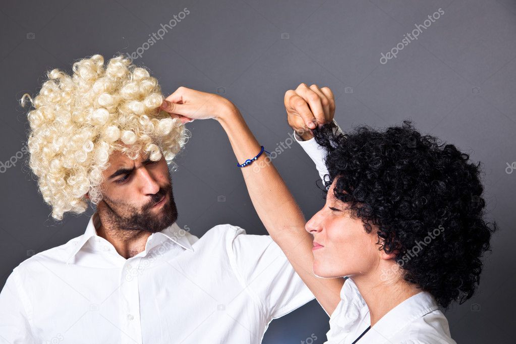 Young Man and Woman with Colorful Funny Wig