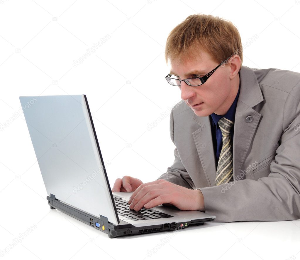 Man and gray laptop