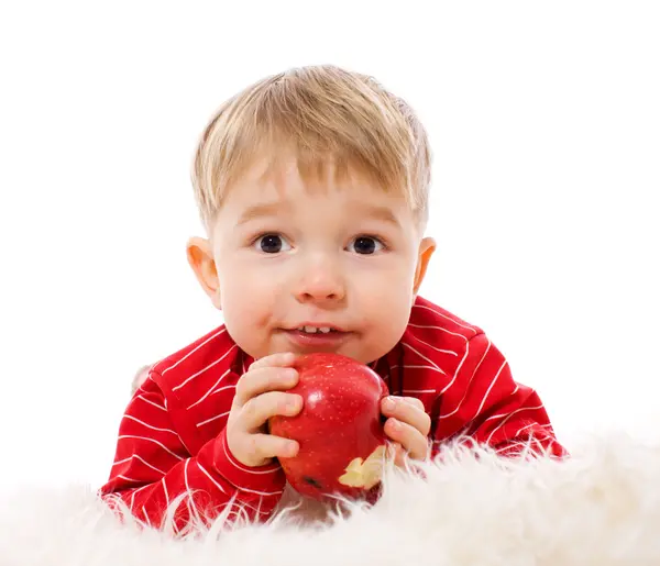 Boy eating apple — Stock Photo, Image