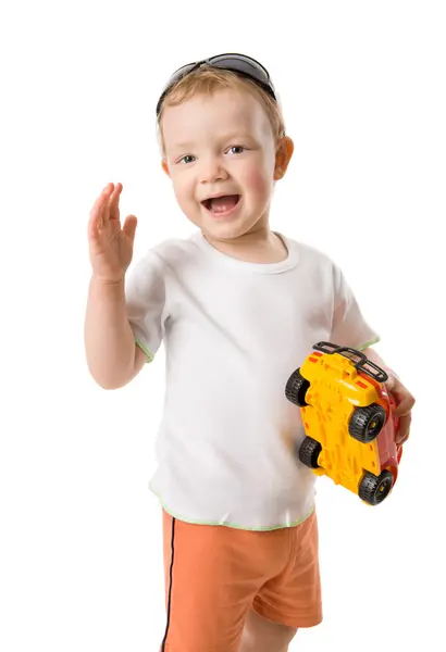 Chlapec hospodářství hračka — Stock fotografie