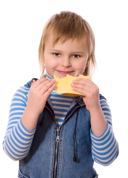 Девочка ест — стоковое фото