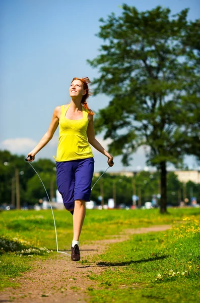 Jumping with skipping rope — Stock Photo, Image