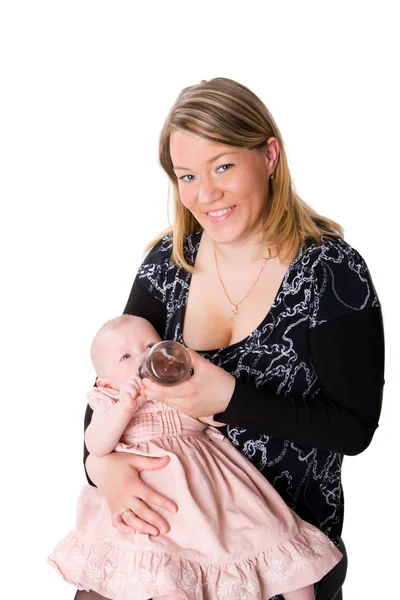 Annesi bebeğini besliyor — Stok fotoğraf