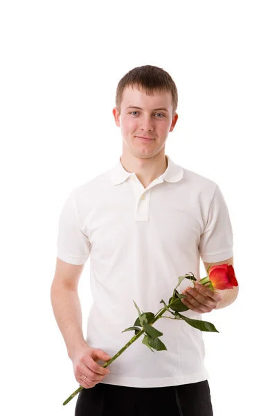장미를 들고 젊은 남자 — 스톡 사진