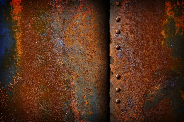 Placa de metal enferrujado com uma costura — Fotografia de Stock