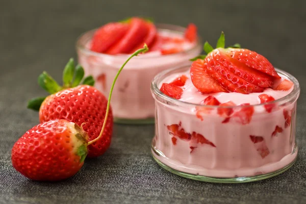 Strawberry yogurt on Grey — Stock Photo, Image