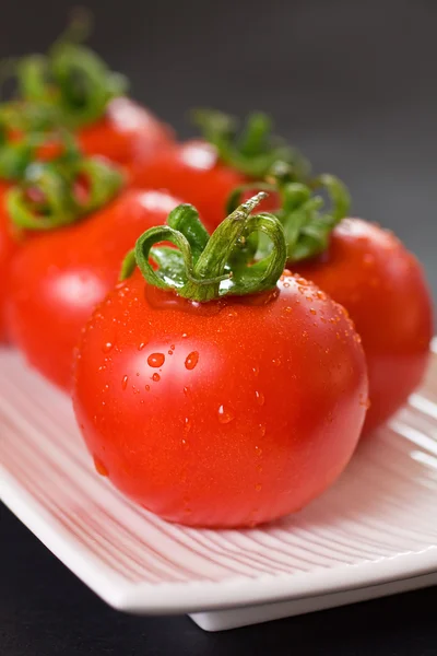 Röda tomater närbild — Stockfoto