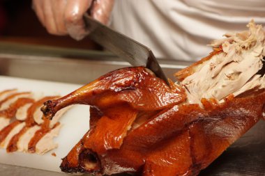 Dressing of Peking Roast Duck clipart