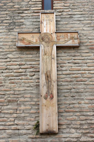 Kříž na stěně — Stock fotografie