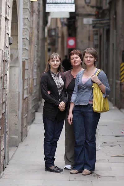 Three women poses at the street — Stock Photo, Image