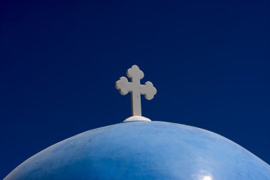Cupola of church on sky background, Santorini clipart