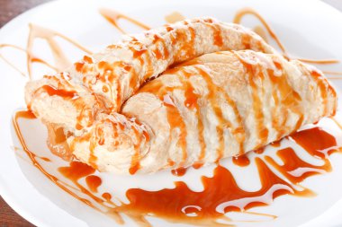 Puff pastry with caramel clipart