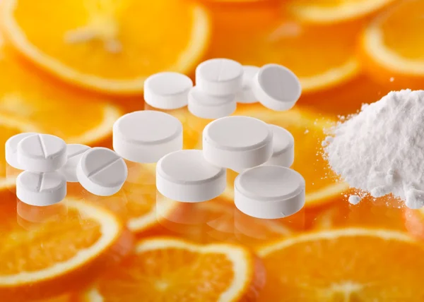 Fehér tabletták narancs — Stock Fotó
