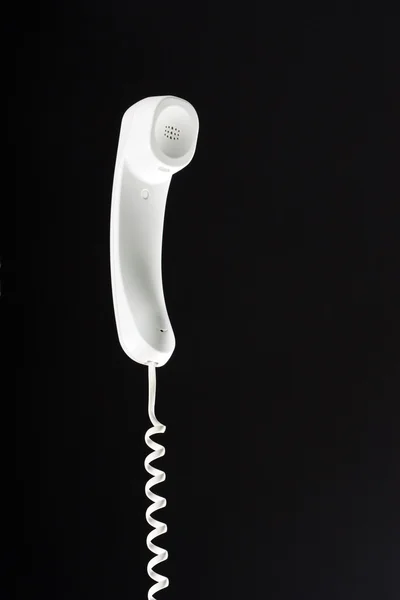 Telephone receiver on cord — Stock Photo, Image