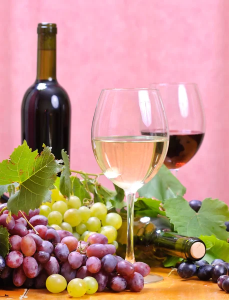 Wine glass with bottle of wine — Stock Photo, Image