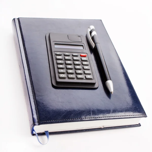 Notebook und Taschenrechner — Stockfoto