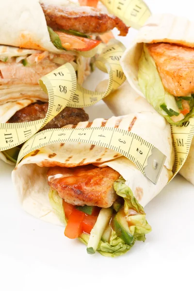 stock image Tortilla wrap with tape measure