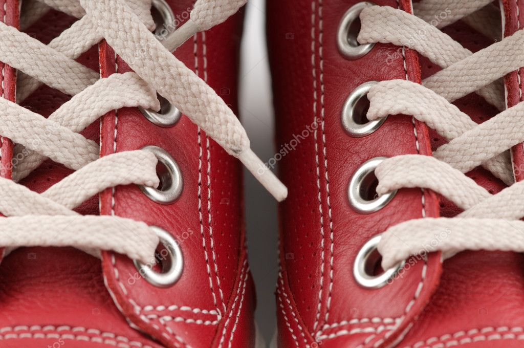 Red leather sneakers Stock Photo by ©nrey_ad 2829806
