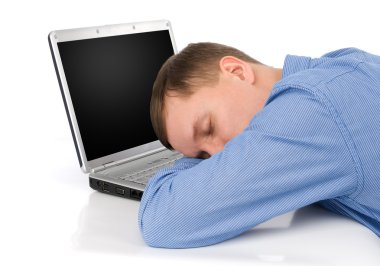 Man sleeping on a laptop clipart