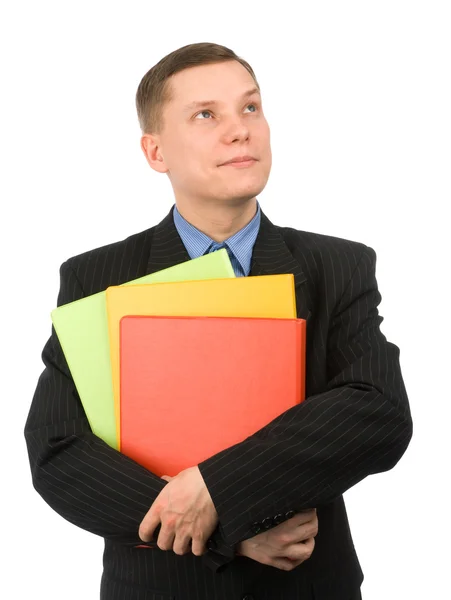 Бизнесмен с цветными папками — стоковое фото