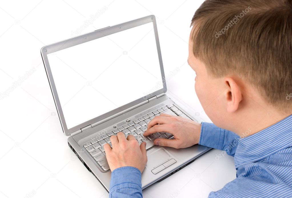 Young man working of a laptop