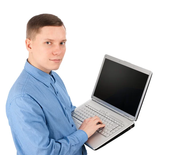 Junger Mann mit seinem Laptop — Stockfoto