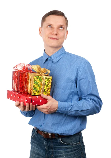 Joven con cajas de regalo — Foto de Stock