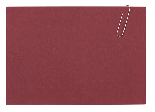 Клип, держащий бланковый лист бумаги — стоковое фото