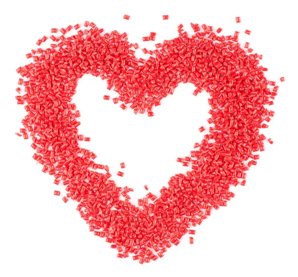Красное пластиковое сердце — стоковое фото