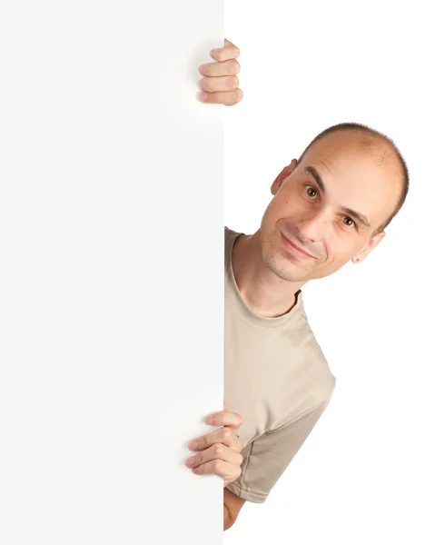 Zadowolony mężczyzna stojący biały puste karty — Zdjęcie stockowe
