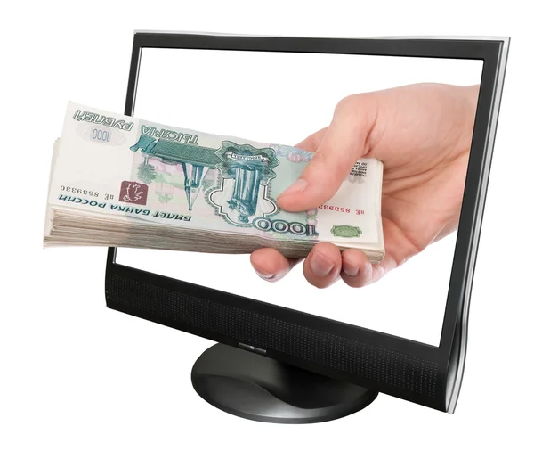 Hand with money and computer monitor — Stock Photo, Image
