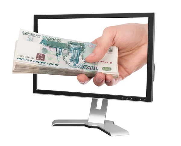Hand mit Geld und Computermonitor — Stockfoto