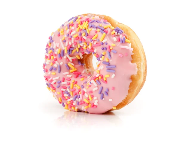 Pink Iced Doughnut covered in sprinkles — Stock Photo, Image