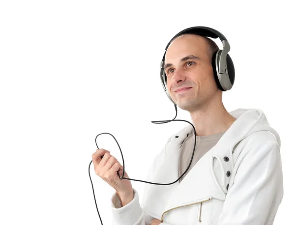 Fiatalember zenét hallgat. — Stock Fotó