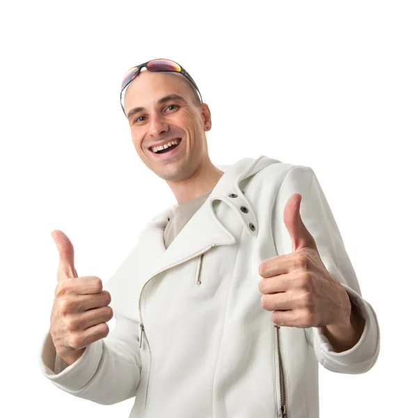 Young man is posing with a thumb up sign — Stock Photo, Image