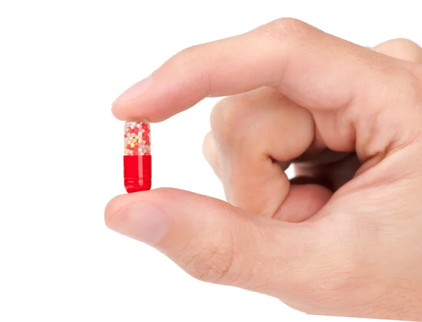 Hand and pill — Stock Photo, Image