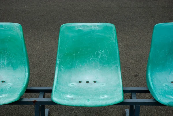 Row of green chairs — Stock Photo, Image