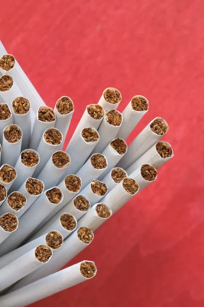 Cigarros em vermelho — Fotografia de Stock