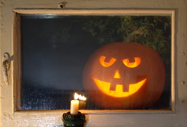 Pumpkin head Behind Window — Stock Photo, Image