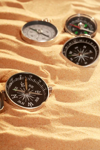 Kompasy na piasku — Zdjęcie stockowe