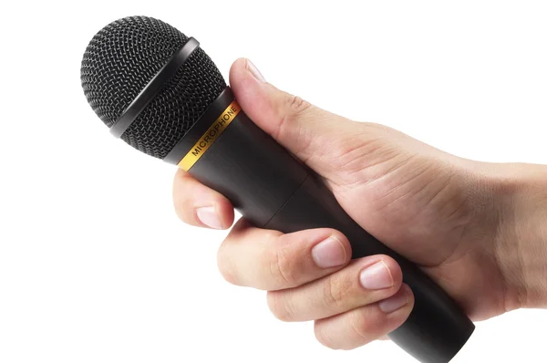 stock image Black microphone in the hand