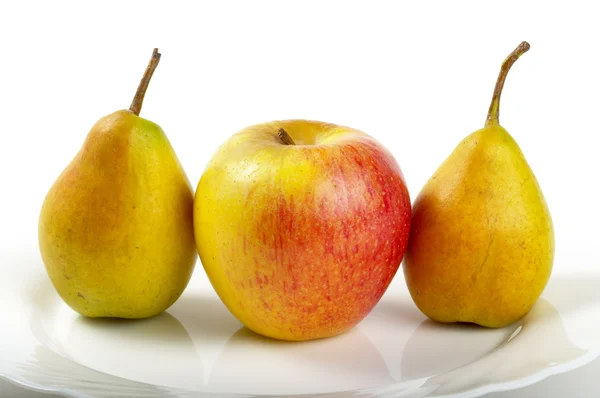 Pears and apple — Stock Photo, Image